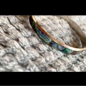 Silver toned and abalone bangle bracelet